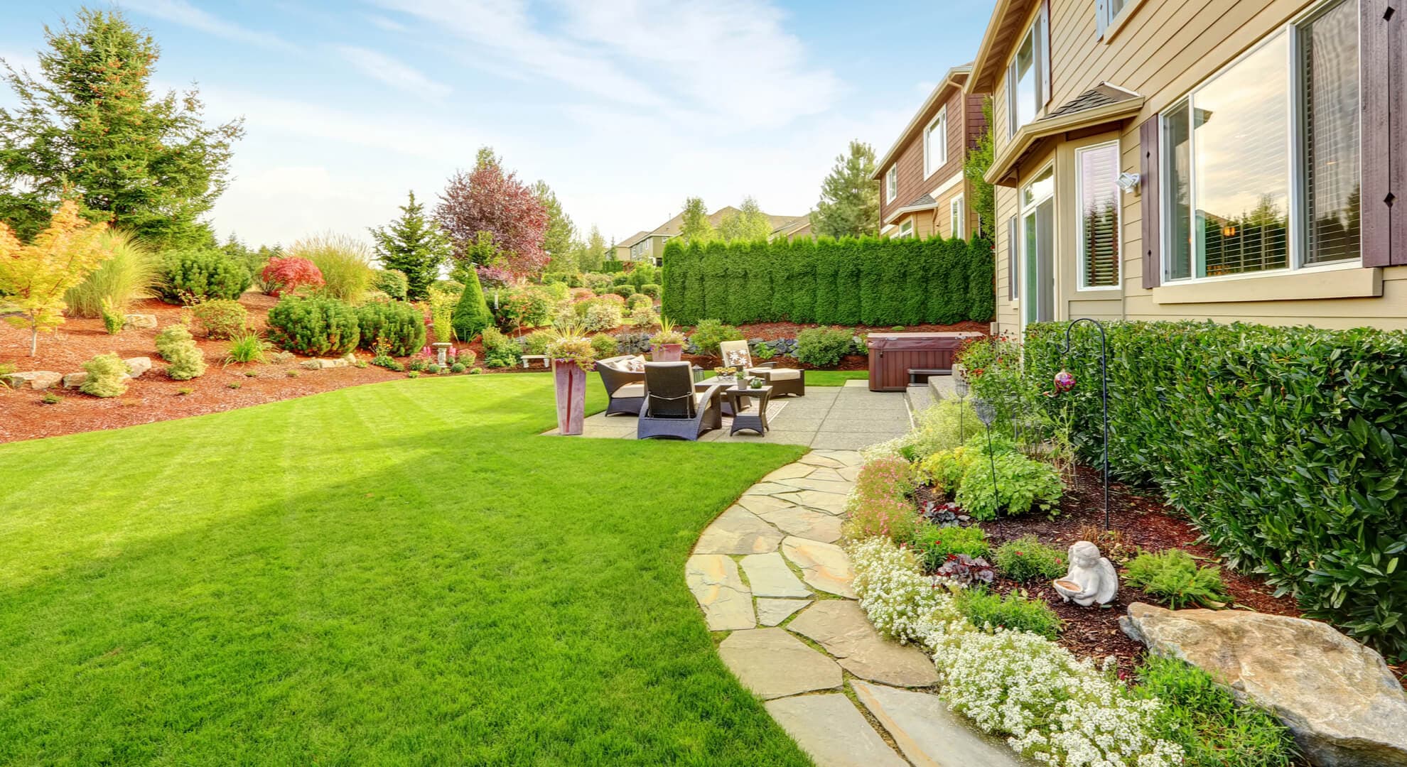 Expertly manicured backyard landscape